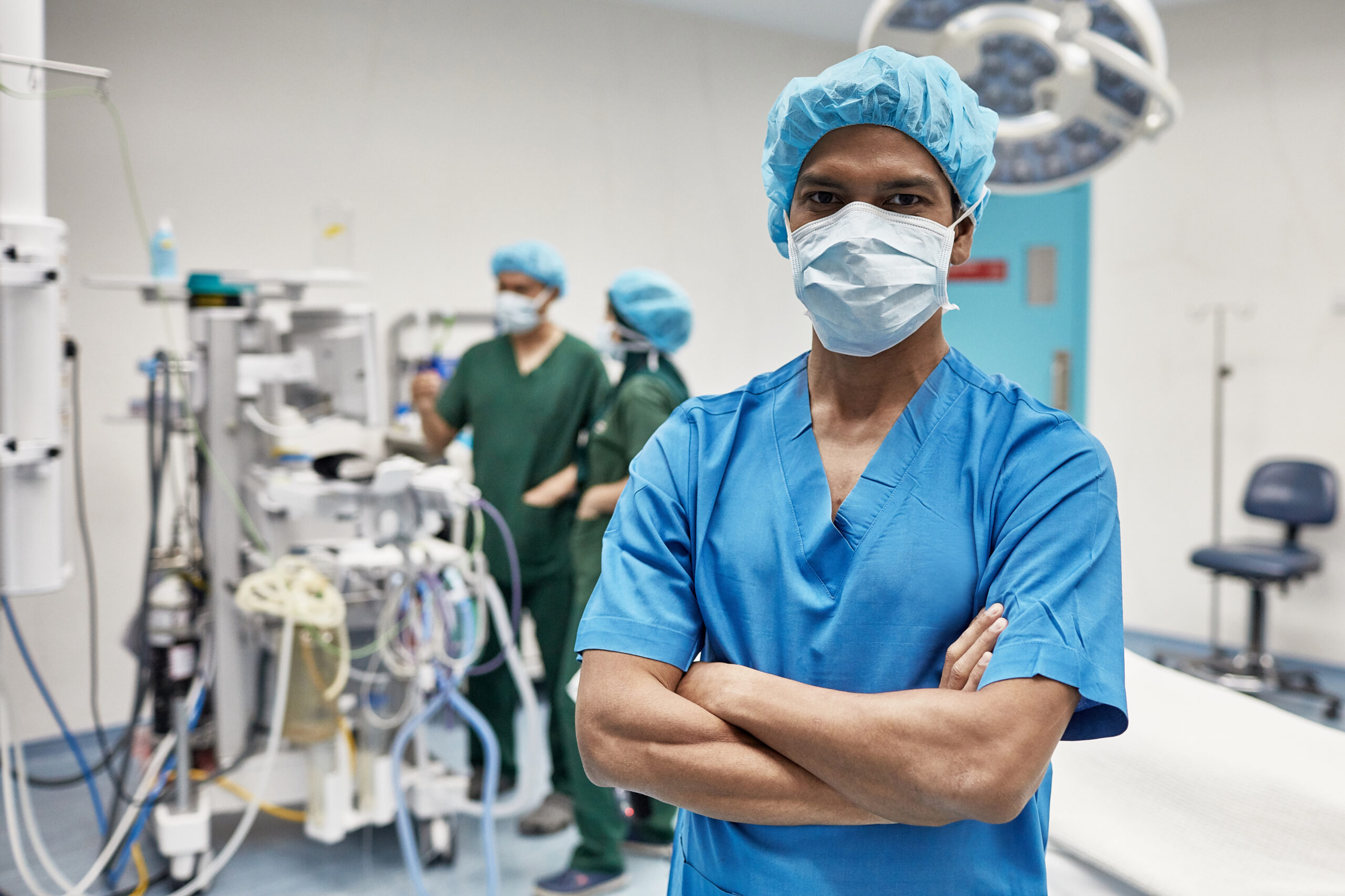 Portrait of Male Surgical Nurse Standing in Operating Room